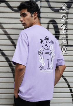 OVERSIZED FLOWER GRAFFITI GLOW IN THE DARK HAUGHTY BEAR (PURPLE) COTTON JERSEY TSHIRT